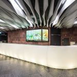 Gestaltung und Planung hinterleuchteter Empfangstresen der Stadthalle