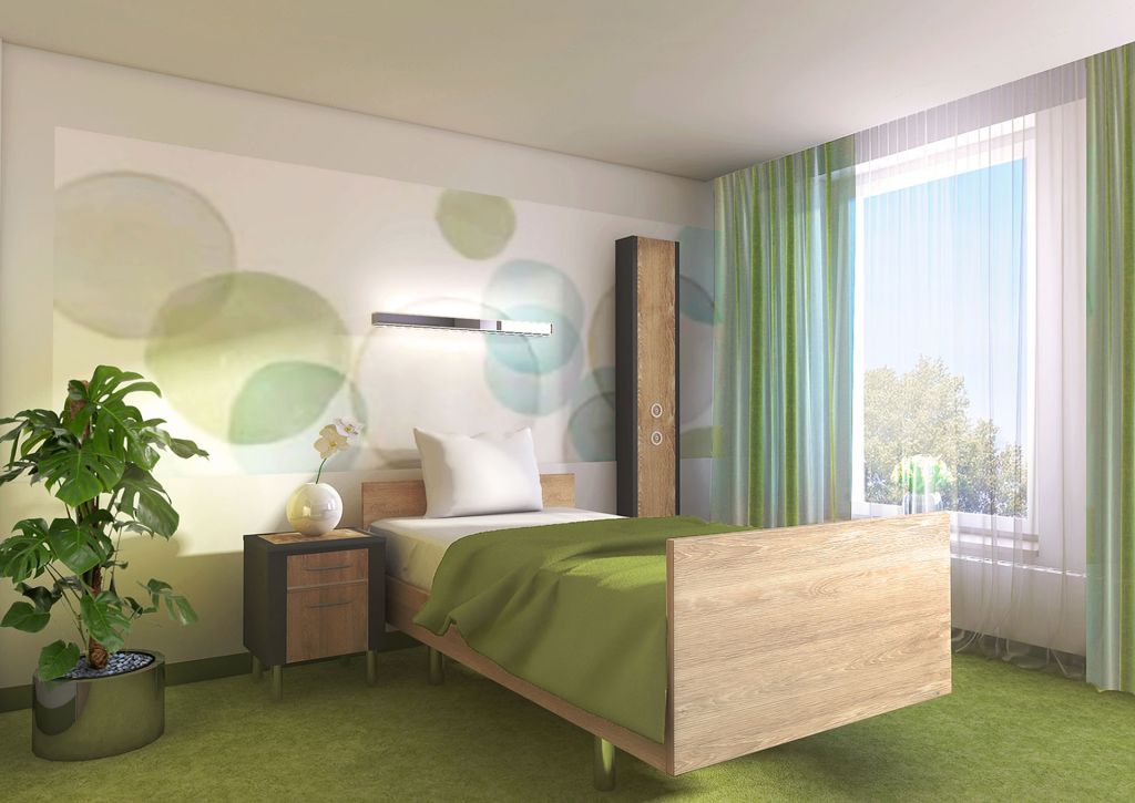 Patientenzimmer mit grünem Teppichboden und grünen Vorhängen