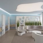 Wartezimmer der Radiologischen Praxis mit großen geschwungenen Sofas und Naturmotiven an den Wänden