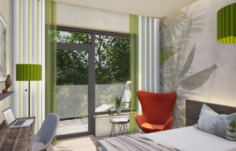Modernes Klinikzimmer mit Schreibtisch, Sessel und Balkonblick
